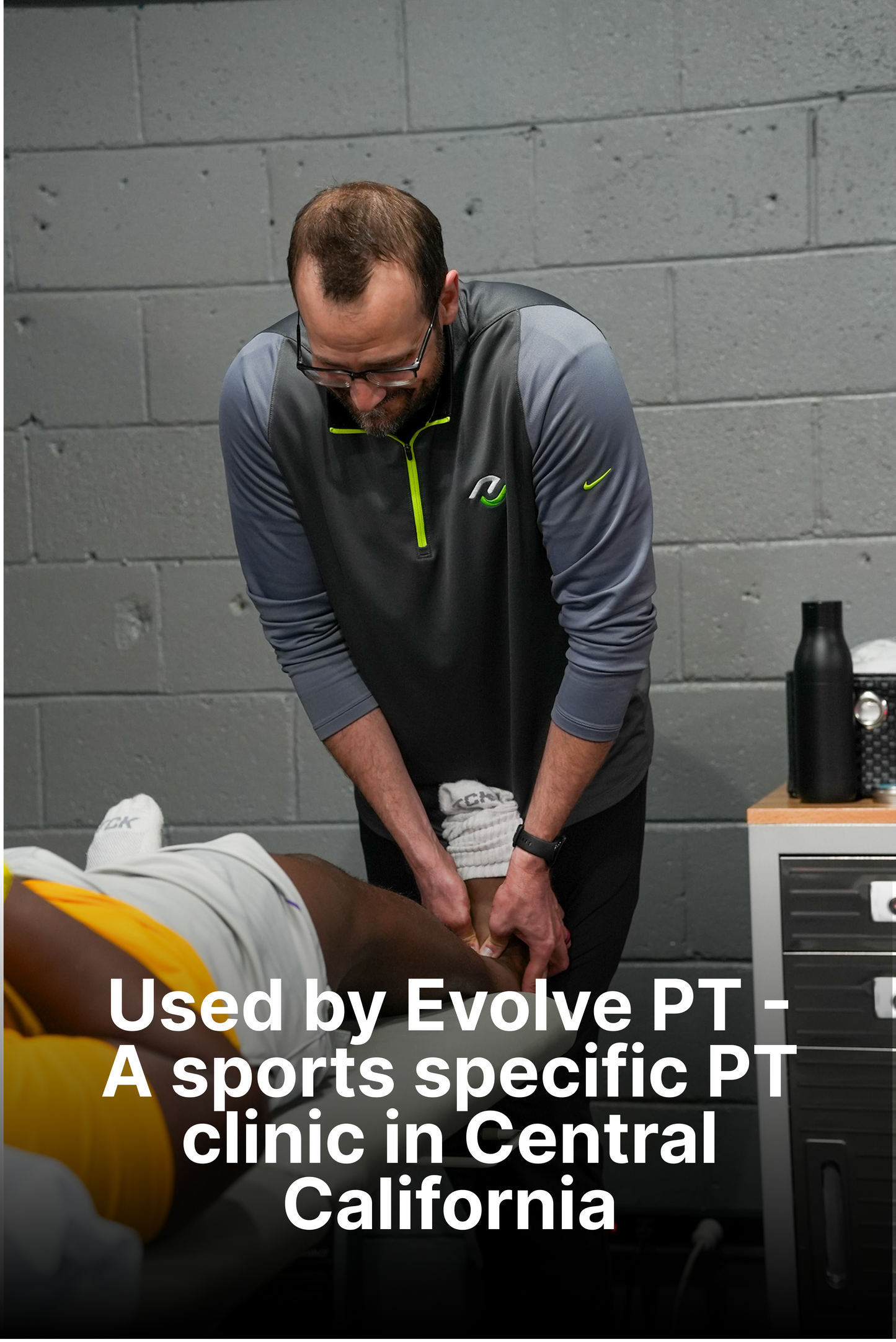 "Physical Therapist stretching patients ankle"