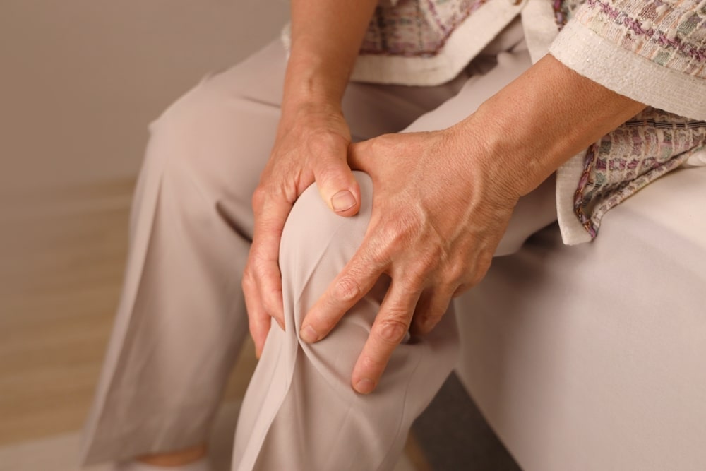 elderly person with knee arthritis