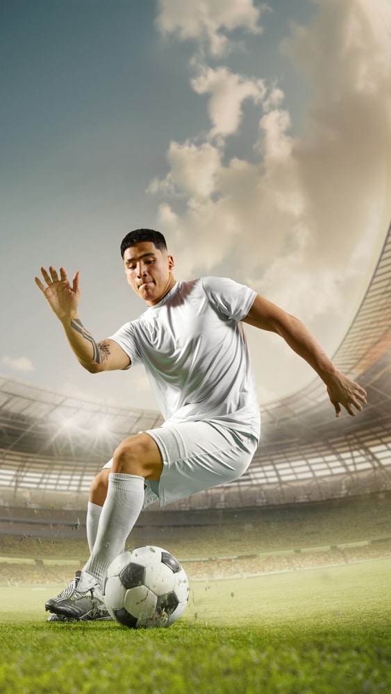 soccer player in white attire