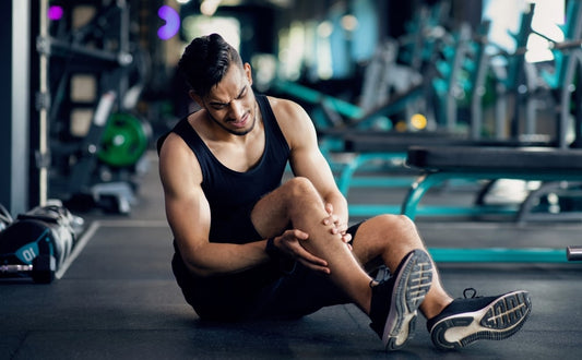 Male Athlete Suffering From Knee Trauma