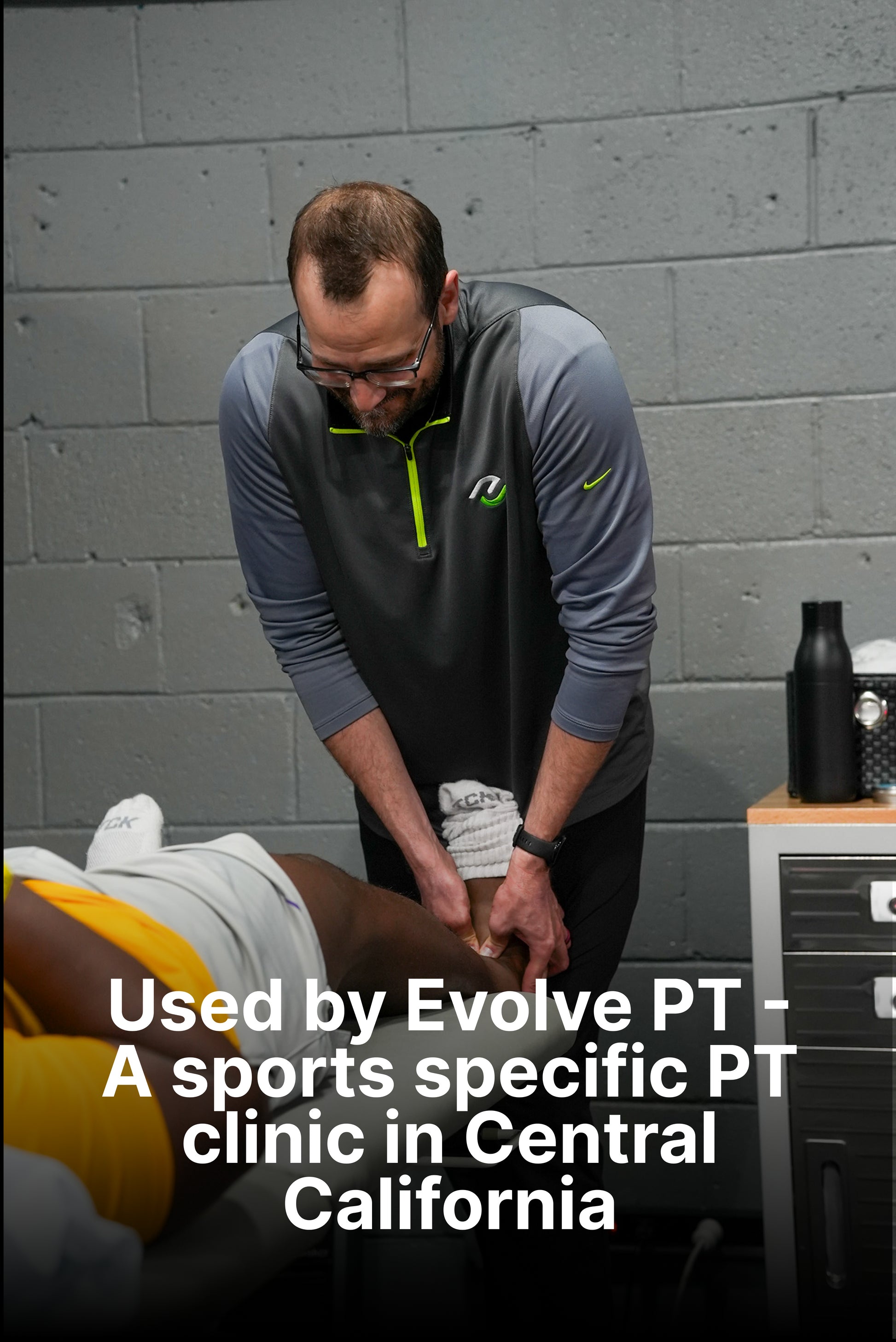 "Physical Therapist stretching patients ankle"